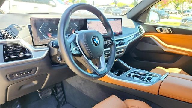 Photo of 2024 Manhattan Green Metallic BMW X5