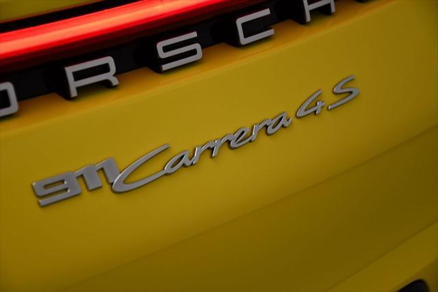 Photo of 2021 Racing Yellow Porsche 911