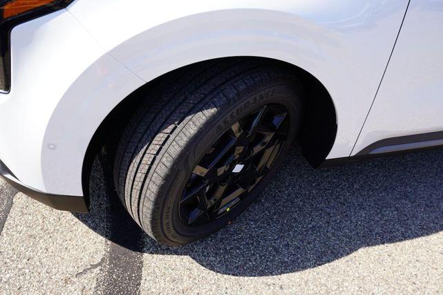Photo of 2026 Snow White Pearl Kia Carnival Hybrid