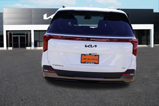 Photo of 2026 Snow White Pearl Kia Carnival Hybrid