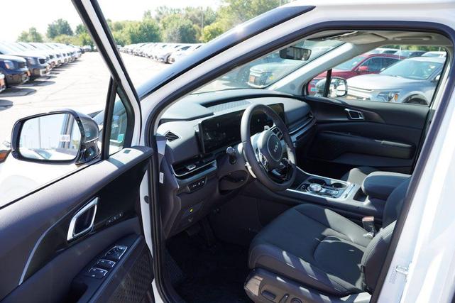 Photo of 2026 Snow White Pearl Kia Carnival Hybrid