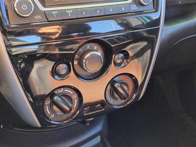 Photo of 2015 Metallic Peacock Nissan Versa Note