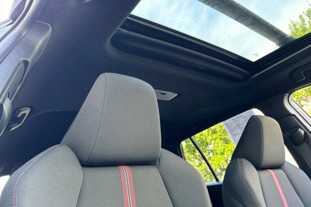 Photo of 2024 Jet Black Toyota Corolla Hybrid