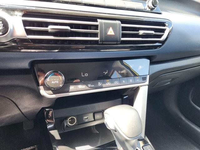 Photo of 2022 Starbright Yellow / Black Roof Kia Seltos