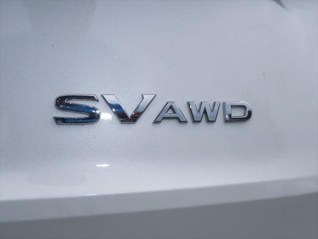 Photo of 2023 Pearl White Tricoat Nissan Rogue