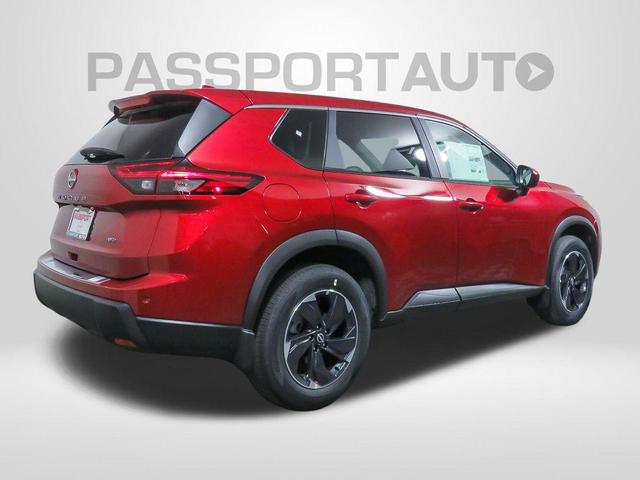 Photo of 2025 Scarlet Ember Tintcoat Nissan Rogue