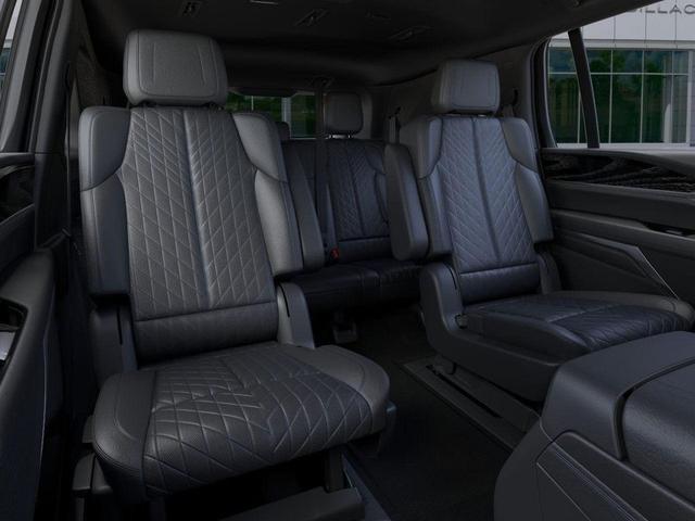 Photo of 2025 Black Raven Cadillac Escalade IQ
