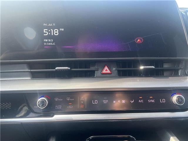 Photo of 2023 Gravity Gray Kia Sportage Hybrid