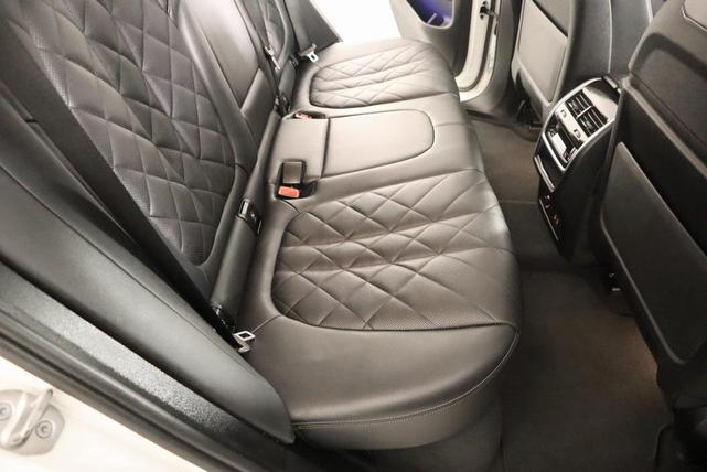 Photo of 2024 Mineral White Metallic BMW X5