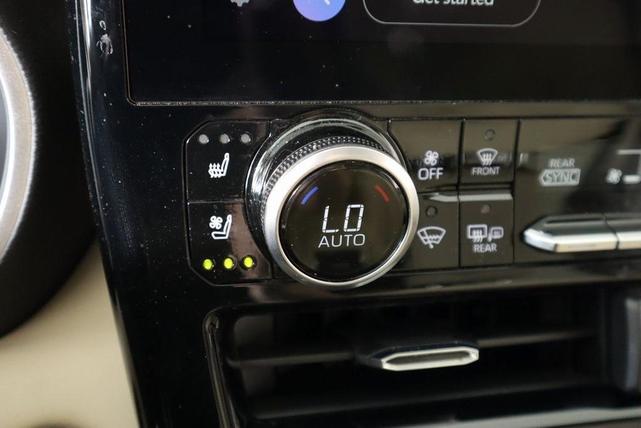 Photo of 2023 Wind Chill Pearl Toyota Highlander Hybrid