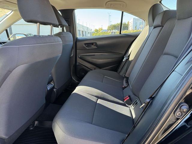 Photo of 2025 Midnight Black Metallic Toyota Corolla Hybrid