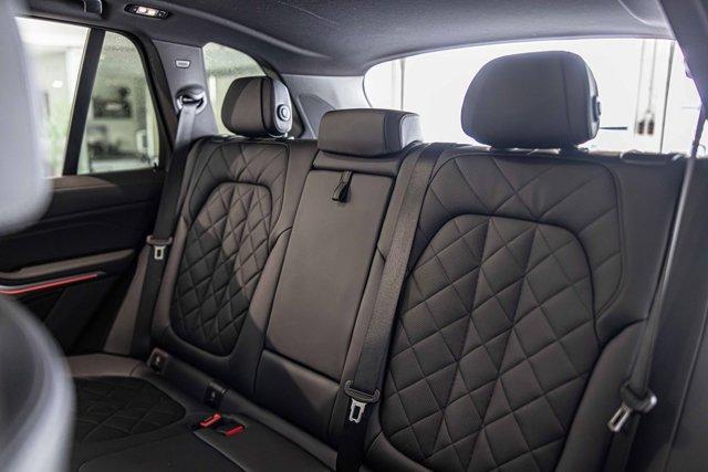 Photo of 2024 Mineral White Metallic BMW X5