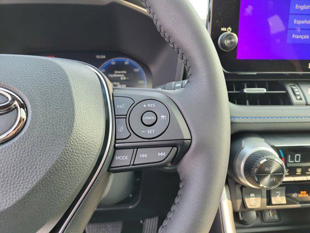 Photo of 2025 Cavalry Blue/Midnight Black Metallic Toyota RAV4 Hybrid