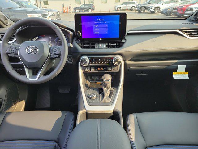 Photo of 2025 Cavalry Blue/Midnight Black Metallic Toyota RAV4 Hybrid