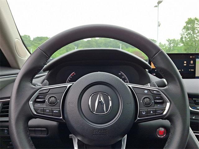 Photo of 2025 Majestic Black Pearl Acura TLX