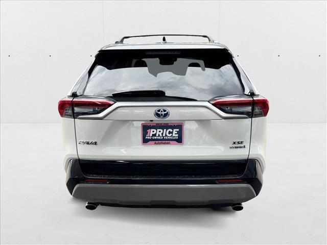 Photo of 2022 Blizzard Pearl/Midnight Black Metallic Toyota RAV4 Hybrid
