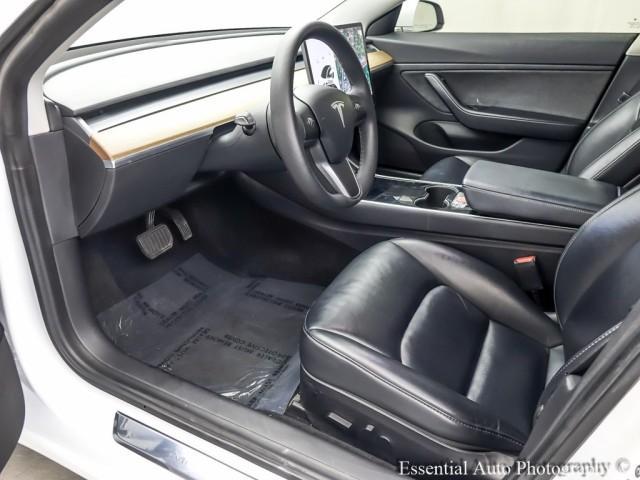 Photo of 2020 Pearl White Multi Tesla Model 3