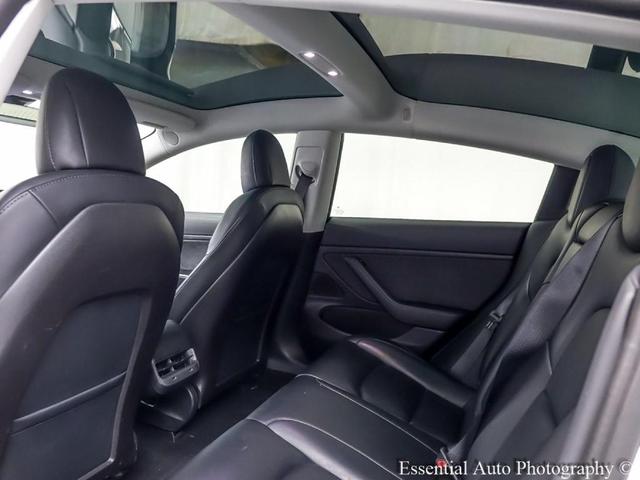 Photo of 2020 Pearl White Multi Tesla Model 3