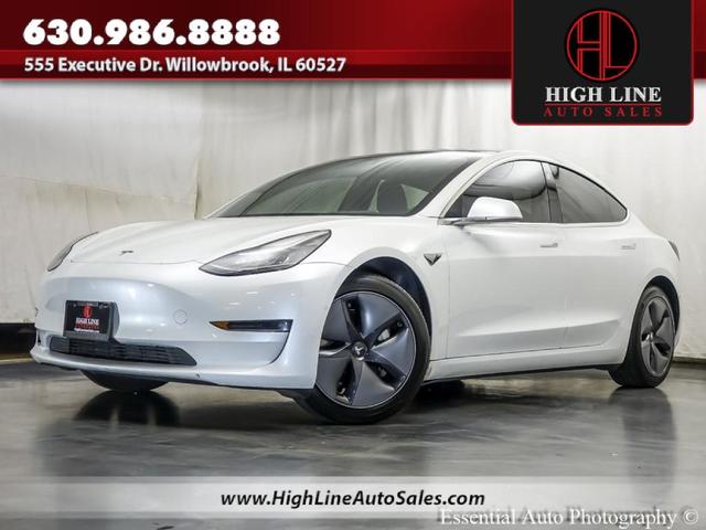 Photo of 2020 Pearl White Multi Tesla Model 3