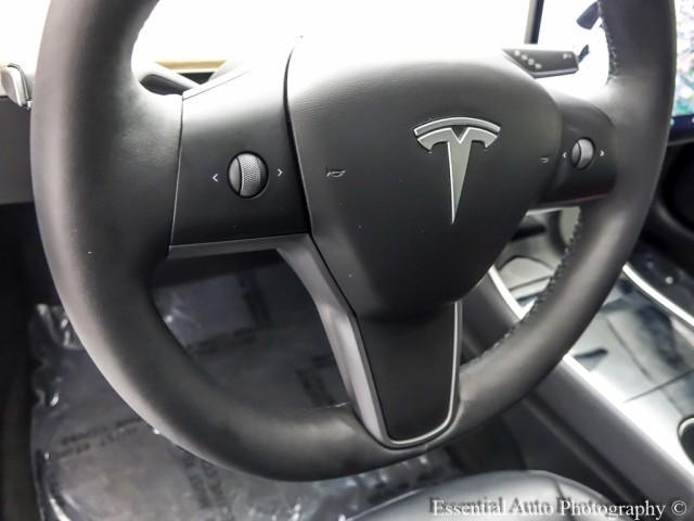 Photo of 2020 Pearl White Multi Tesla Model 3