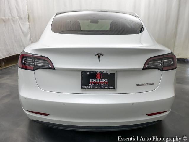 Photo of 2020 Pearl White Multi Tesla Model 3