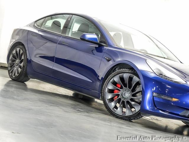 Photo of 2021 Deep Blue Metallic Tesla Model 3