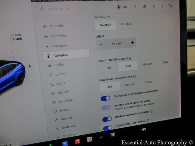Photo of 2021 Deep Blue Metallic Tesla Model 3