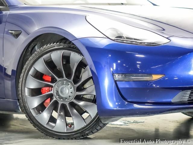 Photo of 2021 Deep Blue Metallic Tesla Model 3