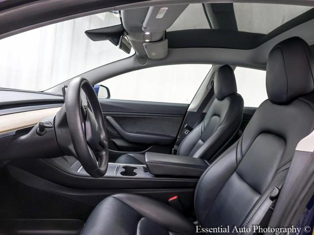 Photo of 2021 Deep Blue Metallic Tesla Model 3