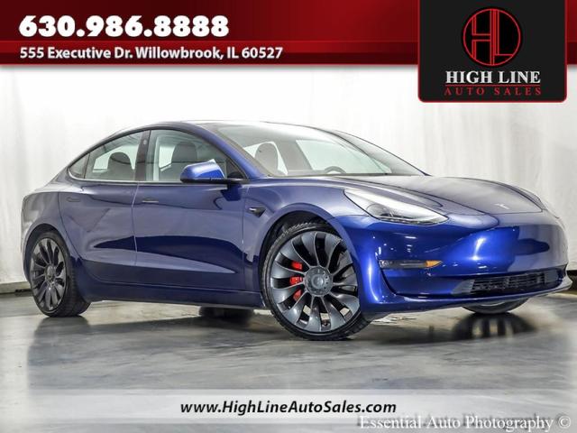 Photo of 2021 Deep Blue Metallic Tesla Model 3