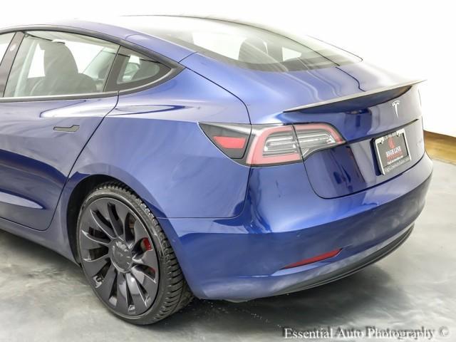 Photo of 2021 Deep Blue Metallic Tesla Model 3