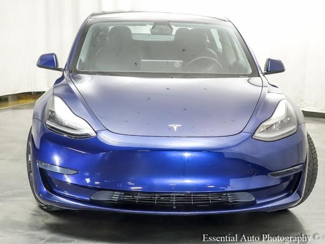 Photo of 2021 Deep Blue Metallic Tesla Model 3