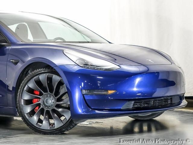 Photo of 2021 Deep Blue Metallic Tesla Model 3