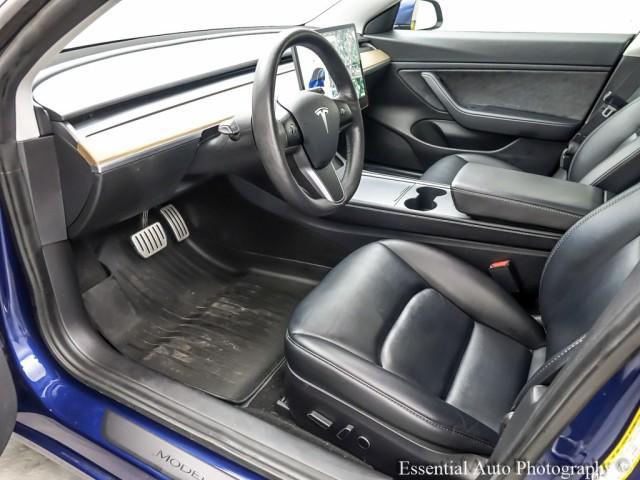 Photo of 2021 Deep Blue Metallic Tesla Model 3