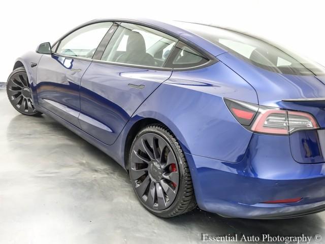 Photo of 2021 Deep Blue Metallic Tesla Model 3
