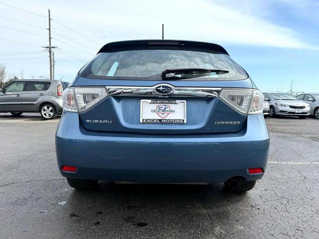 Photo of 2009 Newport Blue Pearl Subaru Impreza
