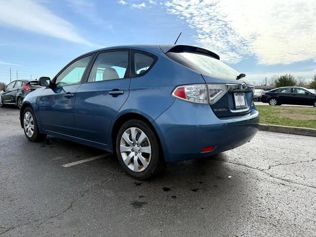 Photo of 2009 Newport Blue Pearl Subaru Impreza
