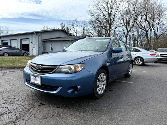 Photo of 2009 Newport Blue Pearl Subaru Impreza
