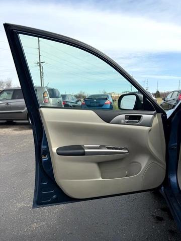 Photo of 2009 Newport Blue Pearl Subaru Impreza