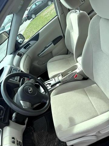 Photo of 2009 Newport Blue Pearl Subaru Impreza