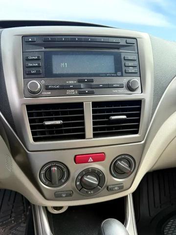 Photo of 2009 Newport Blue Pearl Subaru Impreza