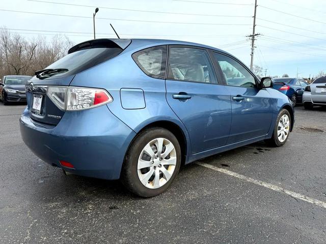 Photo of 2009 Newport Blue Pearl Subaru Impreza