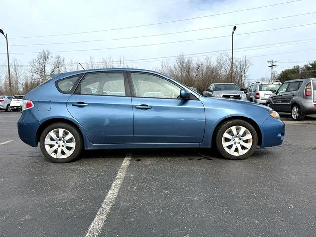 Photo of 2009 Newport Blue Pearl Subaru Impreza
