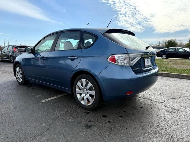 Photo of 2009 Newport Blue Pearl Subaru Impreza