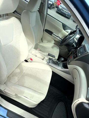 Photo of 2009 Newport Blue Pearl Subaru Impreza