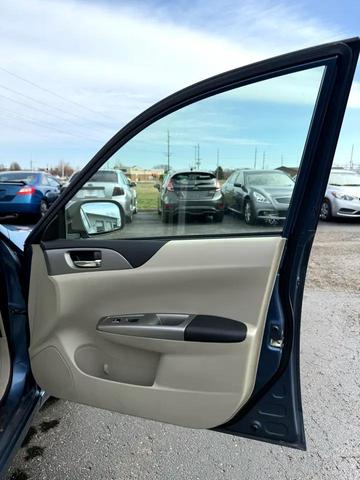Photo of 2009 Newport Blue Pearl Subaru Impreza