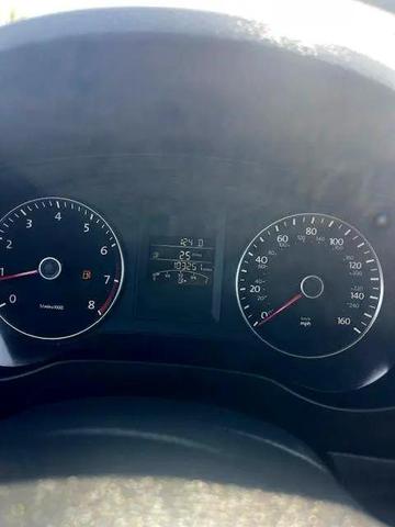 Photo of 2014 Tempest Blue Metallic Volkswagen Jetta