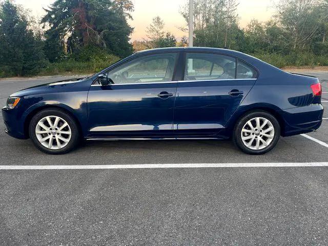 Photo of 2014 Tempest Blue Metallic Volkswagen Jetta