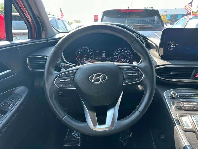 Photo of 2023 Calypso Red Hyundai SANTA FE