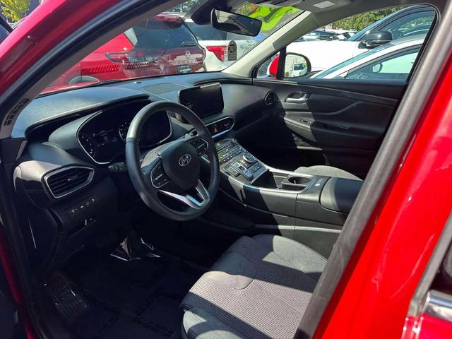 Photo of 2023 Calypso Red Hyundai SANTA FE